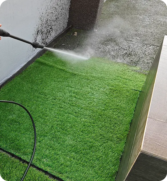 men-washing-his-backyard-garden-concrete-path-stairs-using-pressure-washer